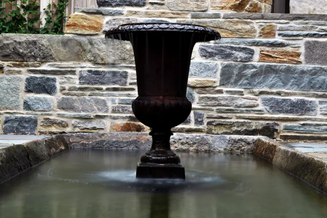 WildWorks formal stone fountain and wall