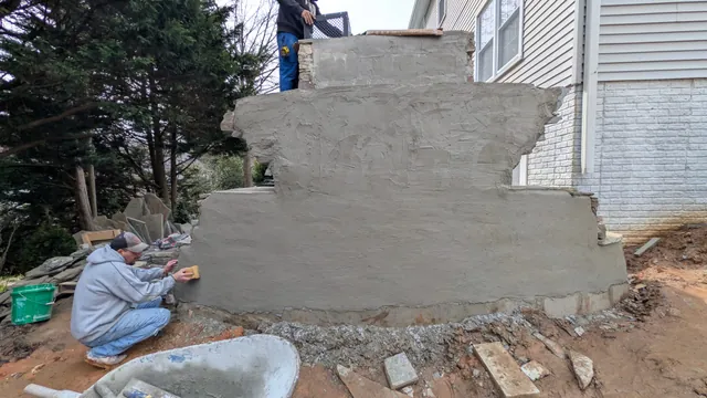 Project Wildfire construction field photo 41, documenting the outdoor fireplace, patio, lounge, and upper deck build